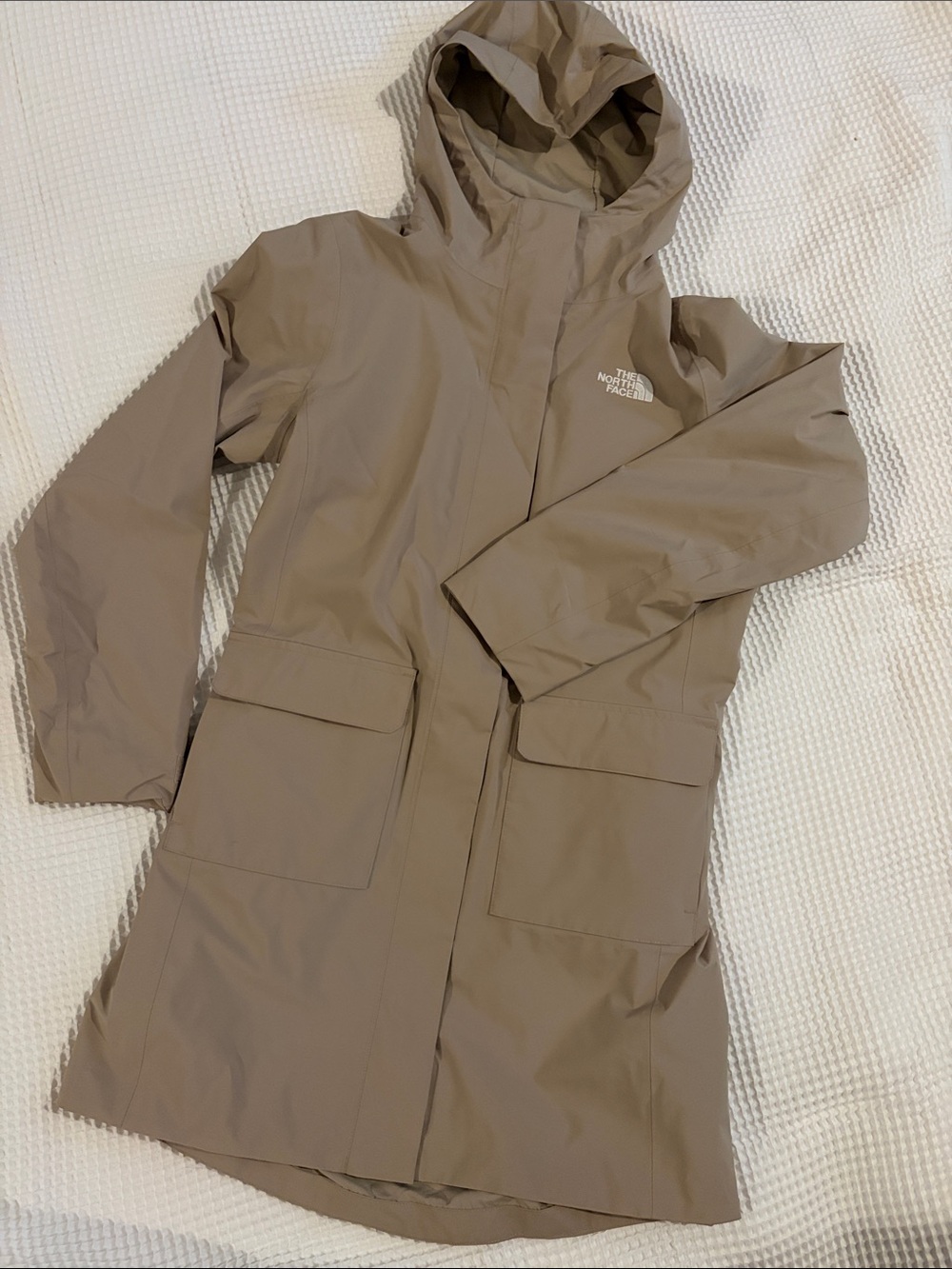 The North Face, women’s hooded rain coat — Beige
